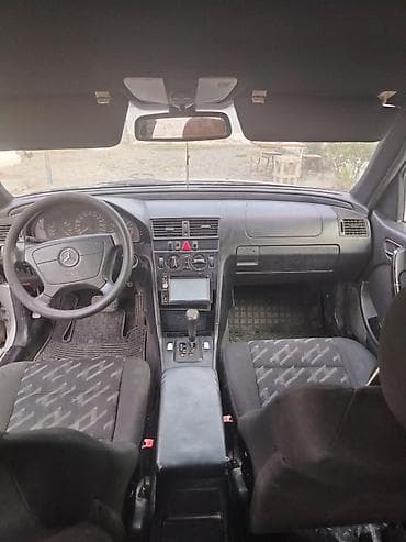 opel astra k: Mercedes-Benz C‑Class Universal (W202) – gümüş rəngli stansiyon vaqon — 6