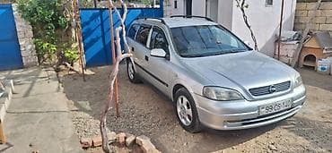 qosqu satilir: Opel Astra: 1.6 l | 1999 il 232000 km Universal — 6