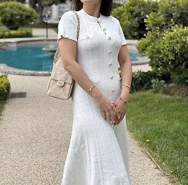 Plaşlar: Ağ rəngli zərif trikotaj midi don

Sandro markasidi — 1