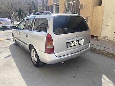 fiat brava 2001: Opel Astra Caravan (universal) – benzinli, avtomatik ötürücülü ailə — 6