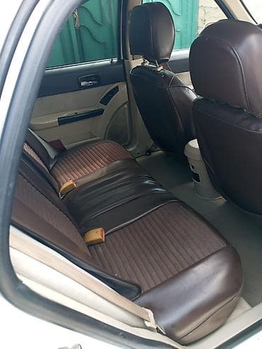 4 teker: Avtomobil: Chery QQ6 (sedan), ağ rəng Kuzov: 4 qapı, ön və arxa — 5