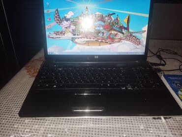 HP noutbuk - Ekran: təxminən 15.6" parlaq LCD - Klaviatura: tam