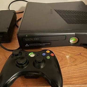 nintendo switch ucuz: Xbox 360 oyun konsolu (Slim model) Xüsusiyyətlər: - Qara rəngli Xbox — 1