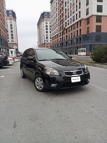 Kia Rio: 1.4 l | 2010 il Hetçbek