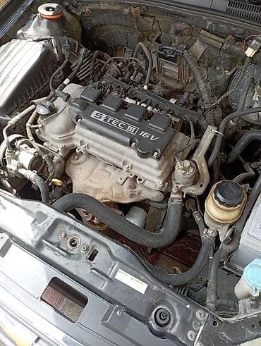 daf ati 400: Daewoo Gentra: 1.5 l | 2013 il Sedan — 3
