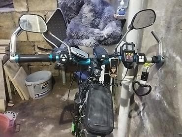 velsibet: Elektriklə təchiz edilmiş dağ velosipedi – yaşıl-qara rəng sxemi — 3