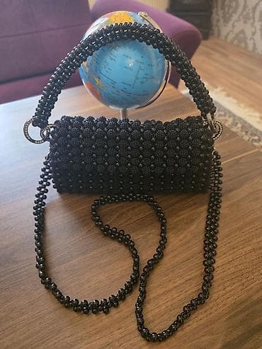 pul kaşloku: Çiyin çantası, Yeni — 1