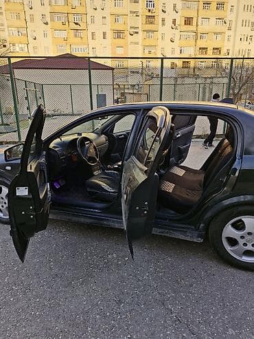 disqi teker satisi: Model: Opel Astra G sedan Kuzov: 4 qapı, tünd yaşıl rəng Mühərrik və — 5