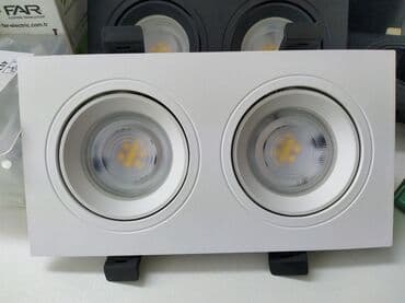 lampa: Ağ rəngdə, dairəvi formalı ikiqat spot işıqlandırma armaturu. Bu — 1