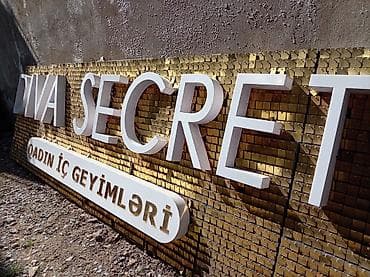 divar paneleri: Məhsul: “DIVA SECRET – QADIN İÇ GEYİMLƏRİ” üçün fasad reklam lövhəsi — 2