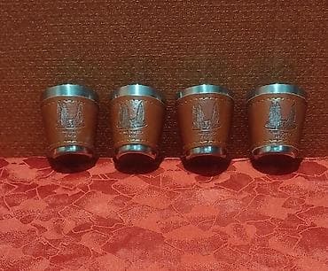 gitara qabi: İçki qabı dəsti şahmat lövhəsi ilə birlikdə satılır. Üzərində Alov — 10