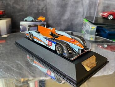 где можно продать марки: Коллекционная модель Aston Martin AMR-One #7 Gulf Team LeMans 2011 — 14