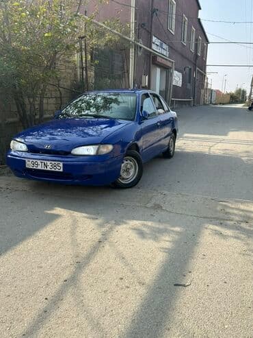 kia sou 2013: Hyundai Accent: 1.5 l | 1995 il Sedan — 6