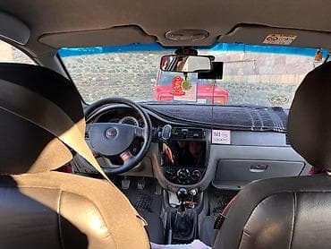 traktor satlir: Daewoo Gentra: 1.5 l | 2014 il Sedan — 5