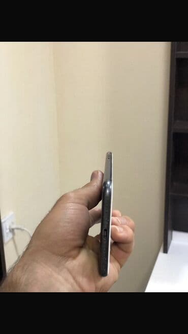 телефон флай металлический корпус: Məhsul: Smartfon (qara/göy rəng tonunda, metal karkaslı) — 2