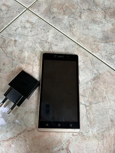 korpuslar: Məhsul: Micromax mobil telefon + orijinal divar adapteri — 2