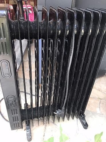 raf buxar utusu: Kumtel KUM-1240S elektrikli yağlı radiator - Güc: 2500 W - Gərginlik — 1