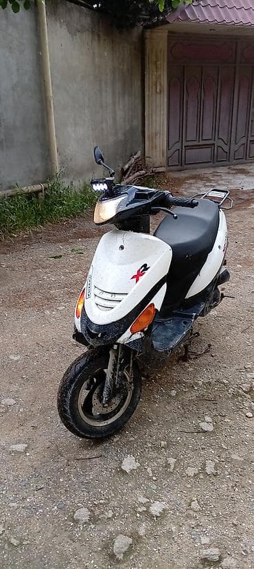 elektra skuter: Moped pol oborot sür getsin prablemi zamok dəyişməli birdə tormuz belə — 2