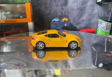 metbex tavan modelleri: Коллекционная модель Nissan 370Z Z34 yellow 2008 DeAgostini Scale — 5