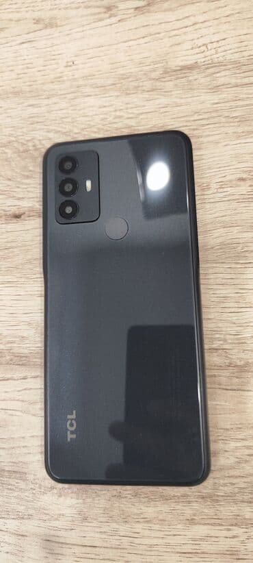 телефон fly 3 симки: TCL smartfon 6102h 3/32 Endirim olacaq Xüsusiyyətlər: - Tam ekranlı — 1