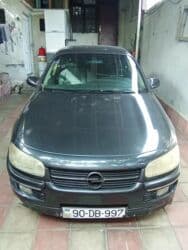 maşın üçün ətir: Opel sedan - Kuzov: 4 qapılı sedan, tünd rəng - Nömrə: AZ 90-DB-997 — 1