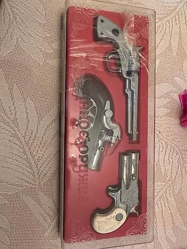 Uşaq oyuncağı – “Qərb Kovboy Silah Dəsti” Məhsulun tərkibi: - 3 ədəd