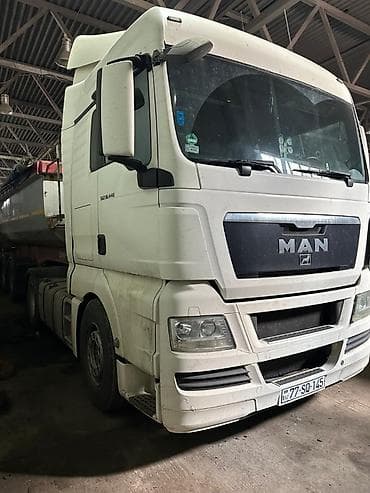 ka 701 traktor: MAN dartıçı + Carnehl üçoxlu damper yarımqoşqu - Marka/model: MAN — 6