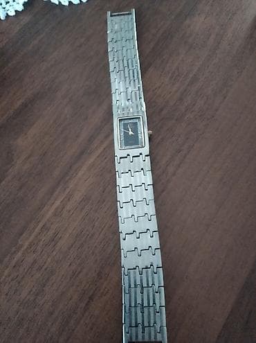 Zərif dizaynlı qol saatı - Korpus və bilərzik: paslanmayan polad