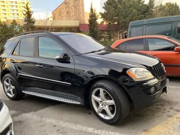 диски разноширокие на бмв х6: Mercedes-Benz ML (W164) – qara rəngli, 5 qapılı premium SUV. Xarici — 1