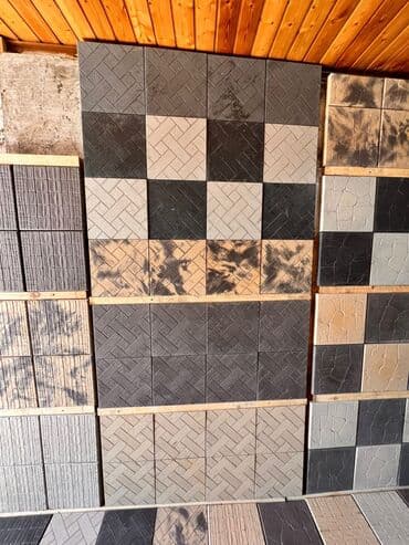 fasad kafelləri: Fasad üçün müxtəlif rəng və fakturalı dekorativ daş panelləri. Bu — 40