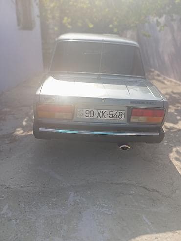 ot bicen traktor satisi: Model: Lada 2107 sedan Rəng: Tünd boz/göy tonları Kuzov: 4 qapı — 8