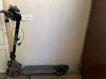 Elektrik nəqliyyatı: Ninebot elektrik skuter - Brend/model: Ninebot by Segway (gövdədə — 2