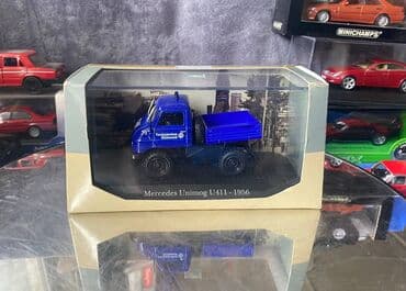 metbex tavan modelleri: Коллекционная модель Mercedes-Benz Unimog U411 Technical Relief blue — 1