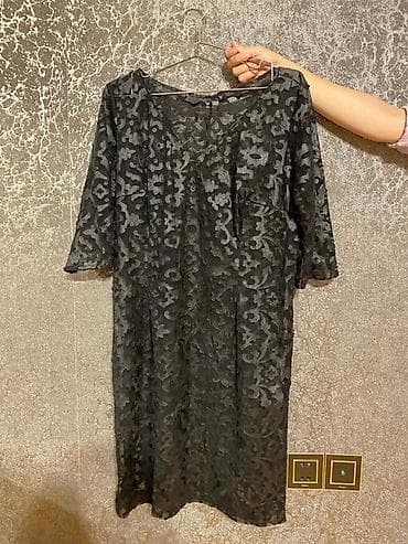 Altinin asadri var (44-46 razmer) Qara rəngli zərif qadın donu. -