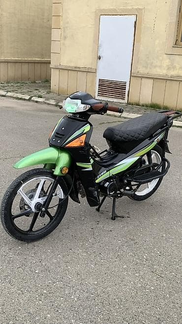 motorlu araba: Moped/skutər – şəhər içi rahat gediş üçün yığcam və qənaətcil model — 6