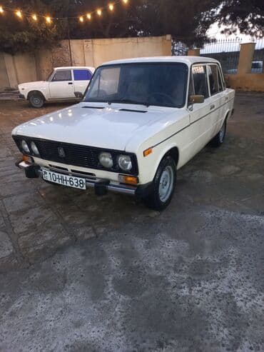 VAZ 2106, ağ rəng, 4 qapılı sedan. - Klassik xarici görünüş: xrom ön