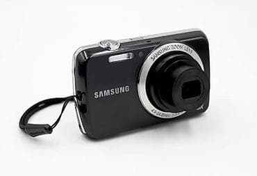 Samsung brendinin kompakt rəqəmsal kamerası. Qara rəngdə olan bu lalafo.az -da Samsung brendinin kompakt rəqəmsal kamerası. Qara rəngdə olan bu