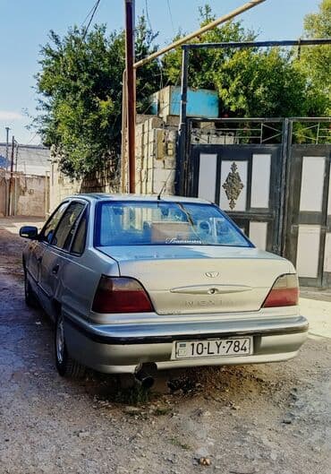 Daewoo Nexia sedan - Gövdə: 4 qapılı sedan, gümüşü rəng - Nömrə lalafo.az -da Daewoo Nexia sedan - Gövdə: 4 qapılı sedan, gümüşü rəng - Nömrə
