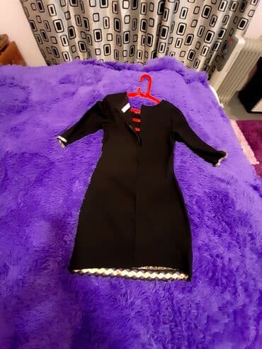 Qara rəngli, zərif detallar ilə bəzədilmiş qısa don. - Model: qolsuz lalafo.az -da Qara rəngli, zərif detallar ilə bəzədilmiş qısa don. - Model: qolsuz