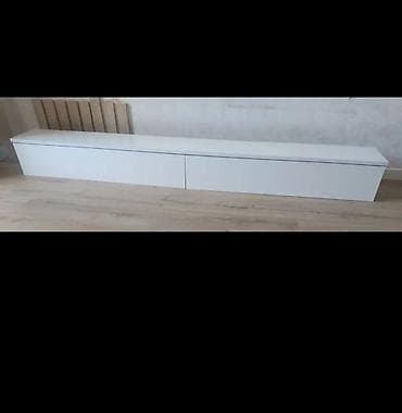 Ağ rəngli divara asma TV tumbası - Minimalist dizayn, parlaq ağ səth at lalafo.az Ağ rəngli divara asma TV tumbası - Minimalist dizayn, parlaq ağ səth