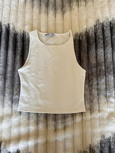 Ağ rəngli qadın topu - Stil: Basic, qolsuz, dairəvi yaxalı, düz lalafo.az -da Ağ rəngli qadın topu - Stil: Basic, qolsuz, dairəvi yaxalı, düz