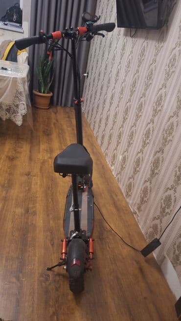 Elektrik skuter – oturacaqlı, güclü asqılı, geniş bortlu model lalafo.az -da Elektrik skuter – oturacaqlı, güclü asqılı, geniş bortlu model