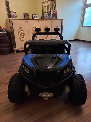 Uşaq üçün elektriklə işləyən off-road tipli maşın – mavi/qara korpus at lalafo.az Uşaq üçün elektriklə işləyən off-road tipli maşın – mavi/qara korpus