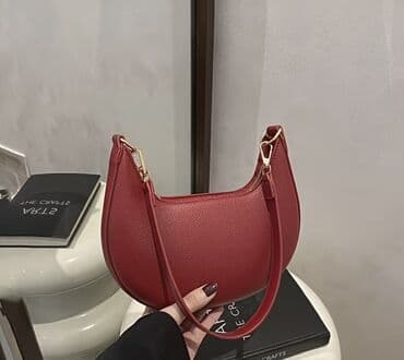 Qırmızı çiyin çantası – minimalist yaxa (crescent) forması - lalafo.az -da Qırmızı çiyin çantası – minimalist yaxa (crescent) forması -
