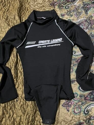 Qadın bodisi – qara rəngdə, uzunqol, boğazlı (yarım turtleneck) model lalafo.az -da Qadın bodisi – qara rəngdə, uzunqol, boğazlı (yarım turtleneck) model