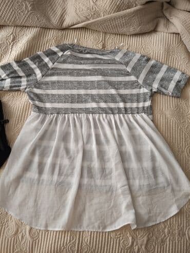 Koton markalı, boz və ağ zolaqlı, qısaqol bluz. Aşağı hissəsi ağ lalafo.az -da Koton markalı, boz və ağ zolaqlı, qısaqol bluz. Aşağı hissəsi ağ