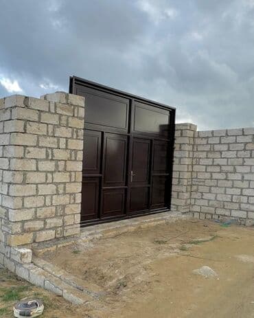 Dəmir Həyət darvazası, Yana açılan, Mexaniki, Qapı ilə, rəng - Qəhvəyi lalafo.az -da Dəmir Həyət darvazası, Yana açılan, Mexaniki, Qapı ilə, rəng - Qəhvəyi