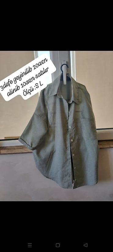 Qadın köynəyi – düyməli, qısaqoll, yumşaq parça. Rəng: boz-yaşıl ton at lalafo.az Qadın köynəyi – düyməli, qısaqoll, yumşaq parça. Rəng: boz-yaşıl ton