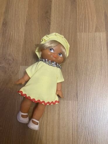 Oyuncaq kukla – şirin sarı dəstdə - Boy: təxminən 20–25 sm - Sarı lalafo.az -da Oyuncaq kukla – şirin sarı dəstdə - Boy: təxminən 20–25 sm - Sarı