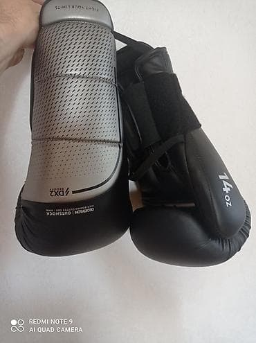 Boks əlcəkləri – 14 oz - Rəng: qara/gümüş - Üst hissə: perforasiyalı lalafo.az -da Boks əlcəkləri – 14 oz - Rəng: qara/gümüş - Üst hissə: perforasiyalı